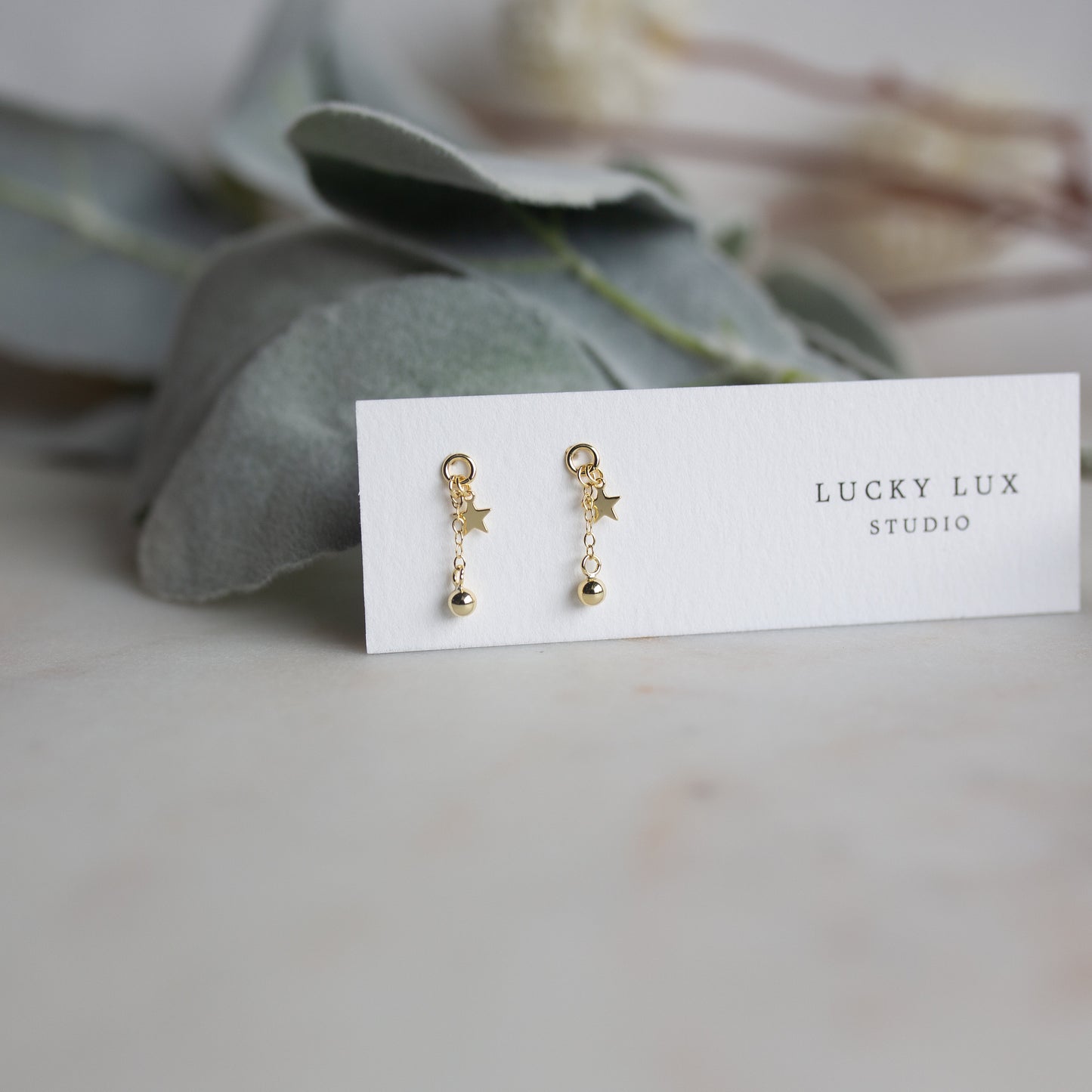 Tiny Star Drop Earrings